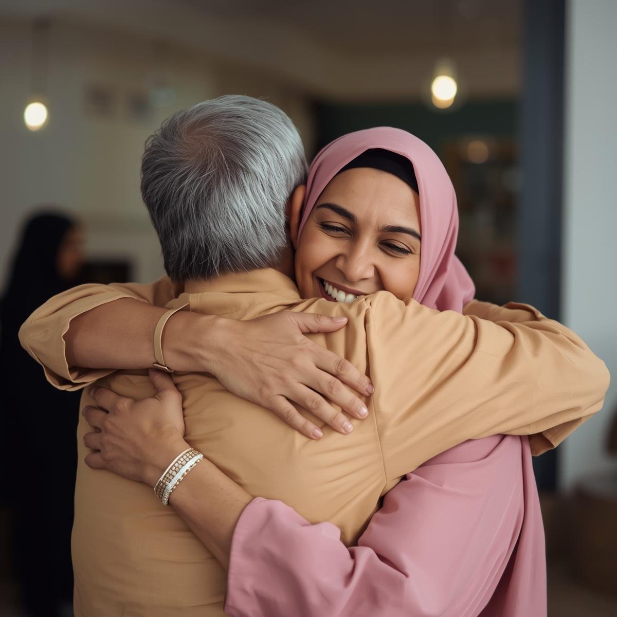 daughter and father hugging